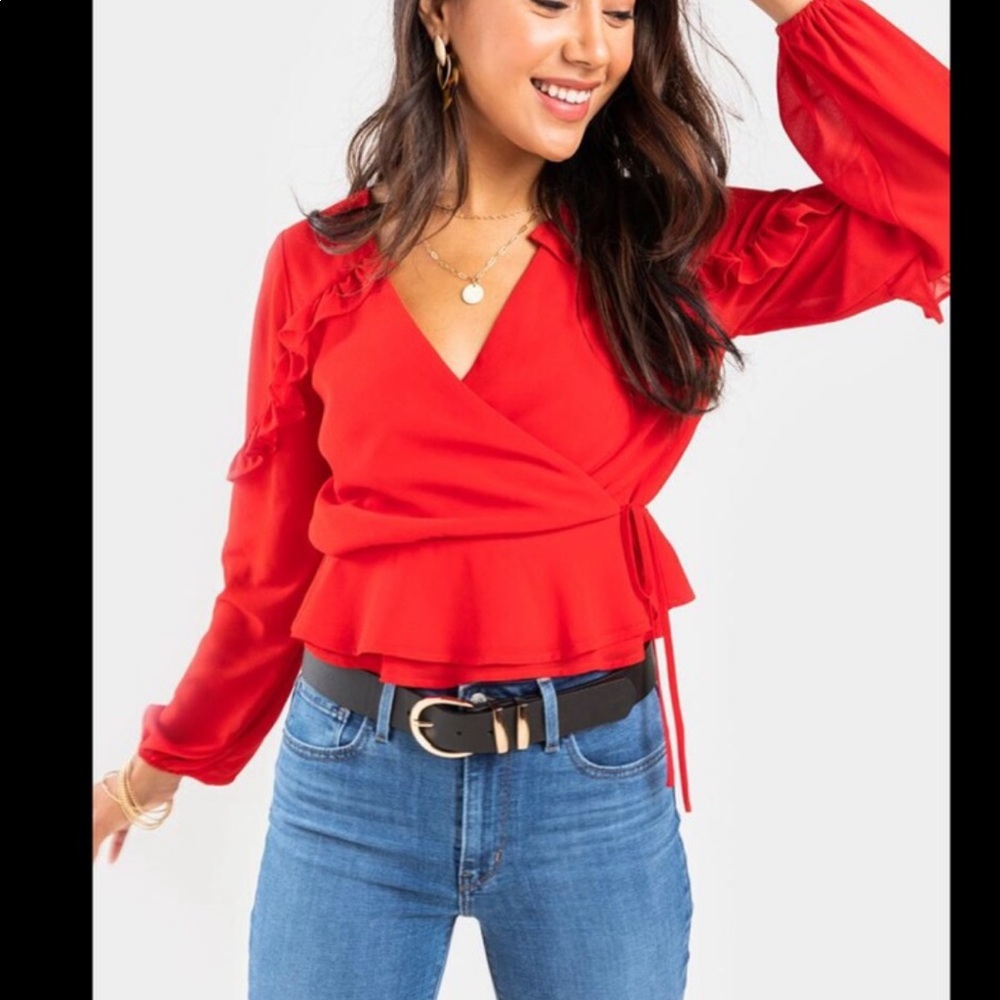 Francesca’s red wrap top